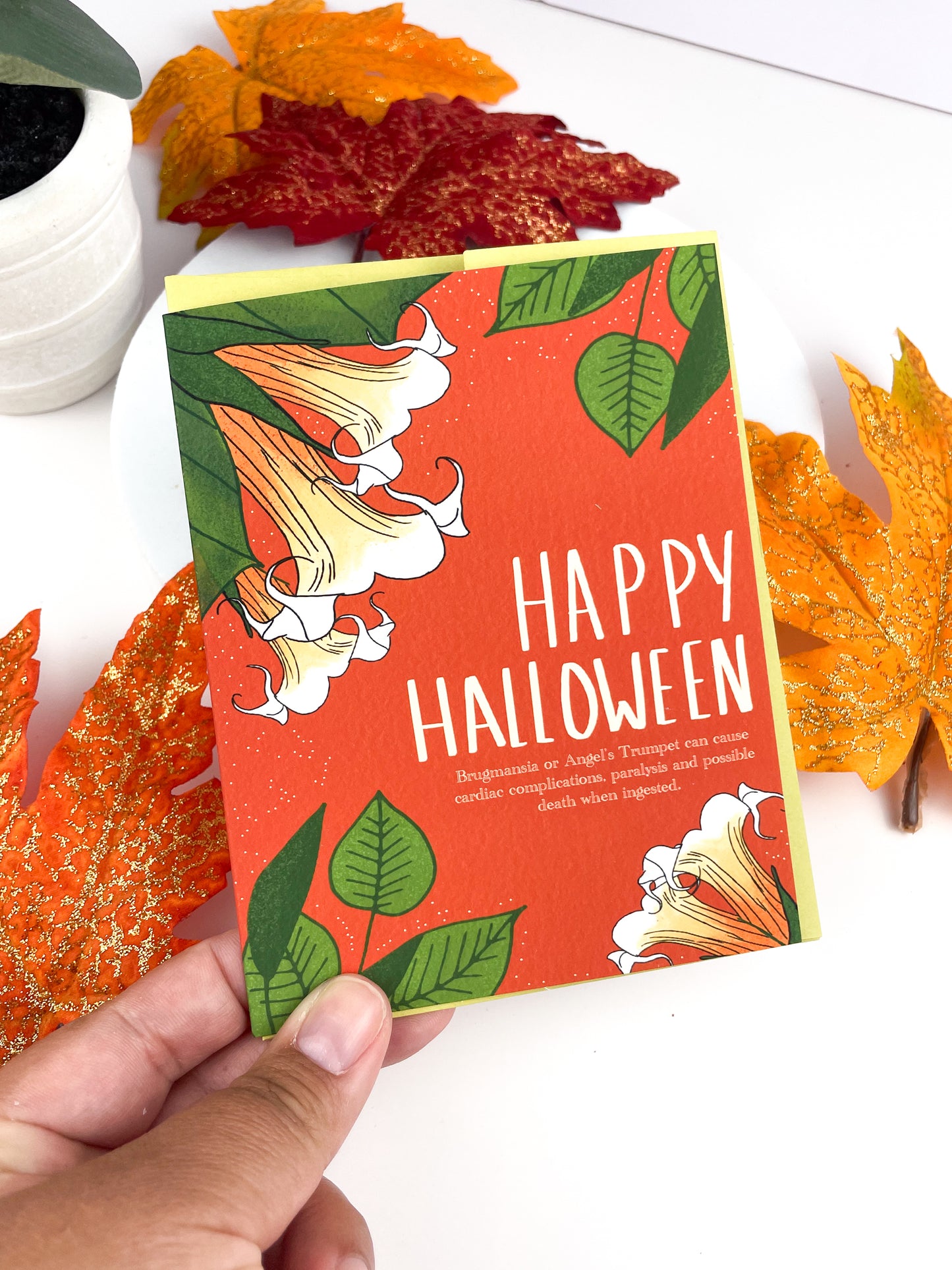 Happy Halloween Greeting Card with Angel's Trumpet