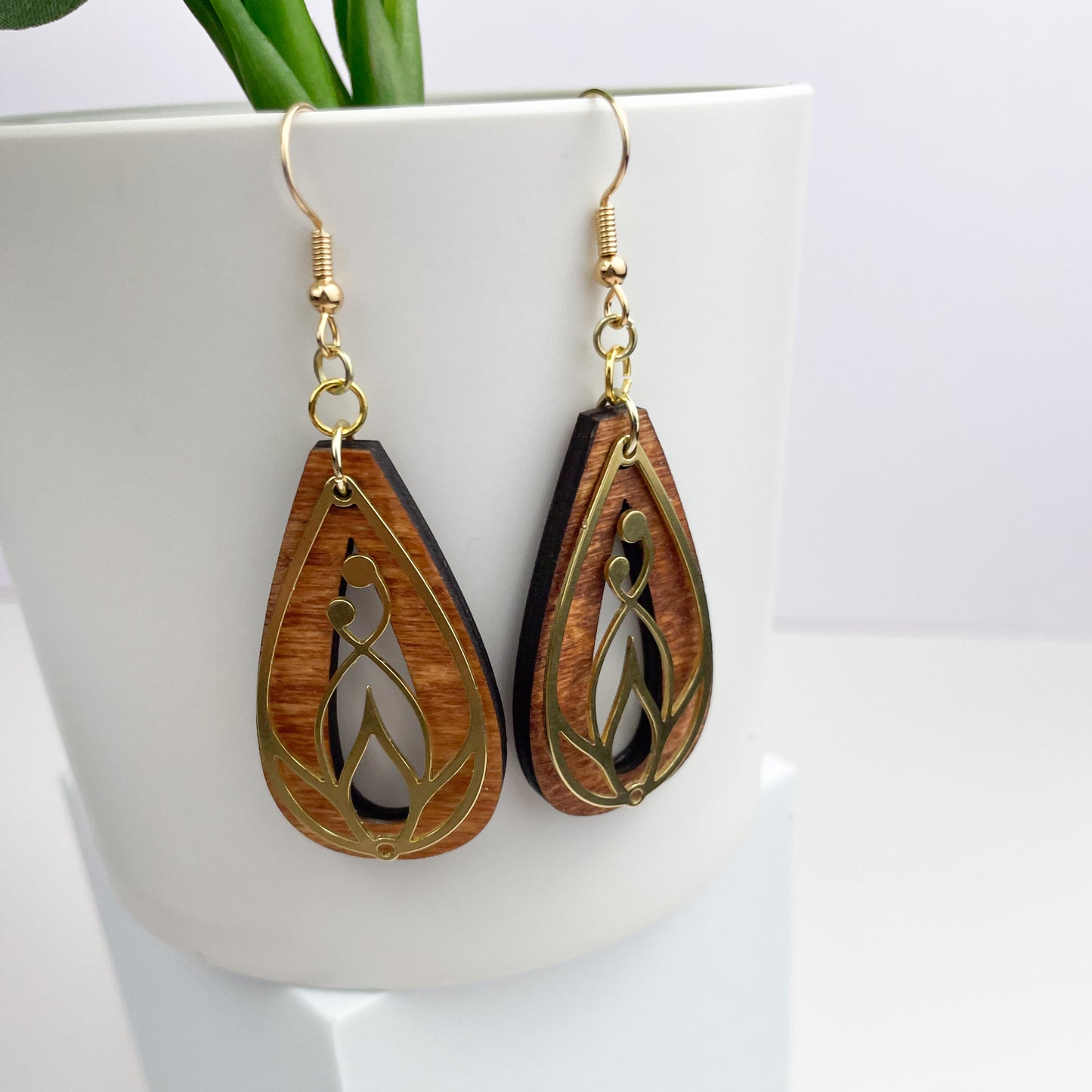 Floral Brass with Open Wooden Tear Drop